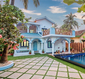 Colorful North Goa villa with a pool and tropical garden