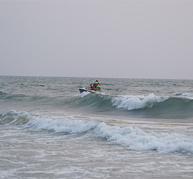 Jet ski riding over waves at Colva Beach Goa