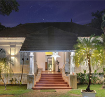 Elegant villa entrance illuminated with festive lighting