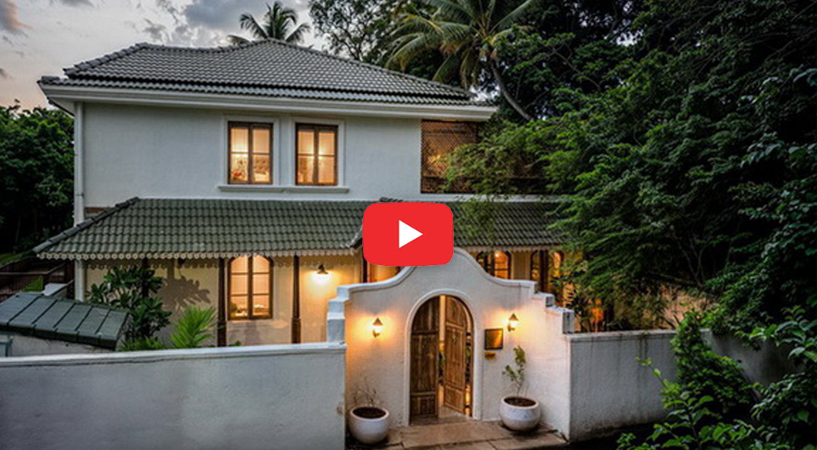 Luxury villa in Goa with elegant architecture surrounded by greenery