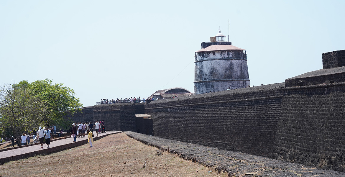 Aguada Lighthouse beside the fort walls in Goa