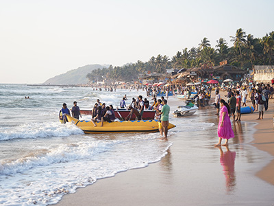 Water sports and visitors at Anjuna Beach, Goa