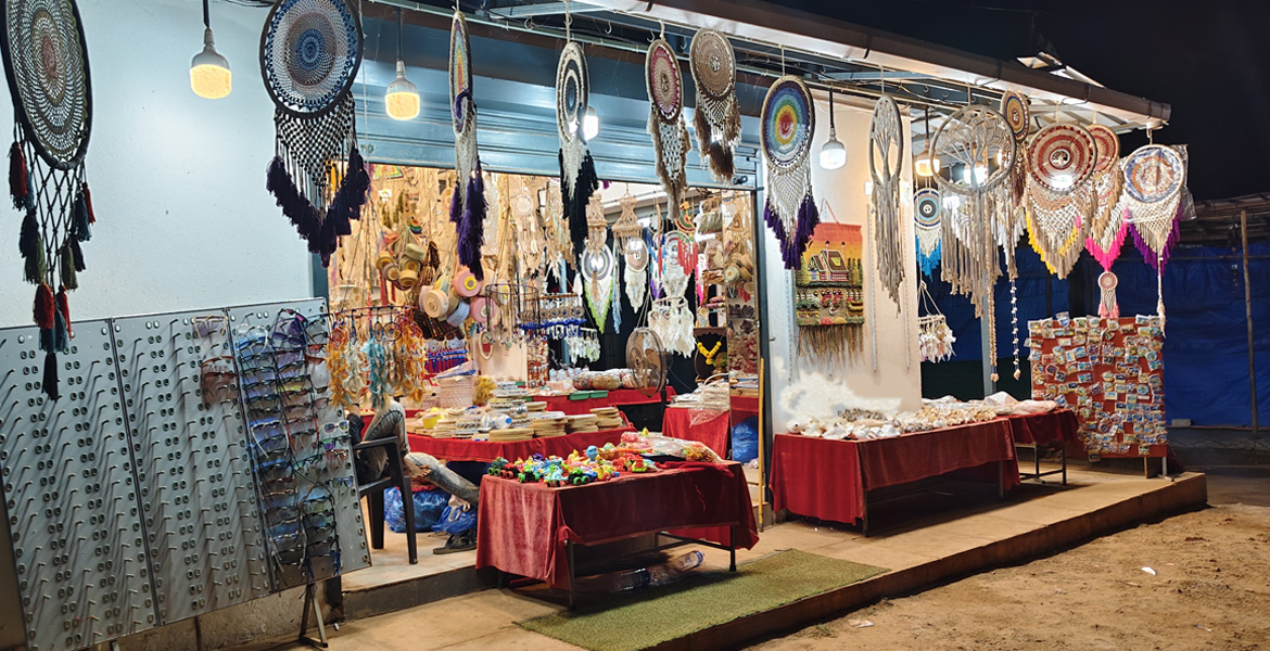 Anjuna Flea Market Goa shop displaying dreamcatchers and handmade crafts