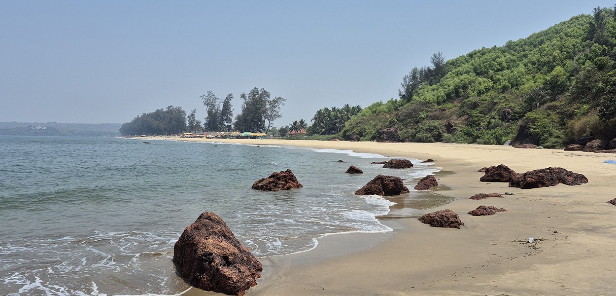 Arambol Beach with rocky shoreline