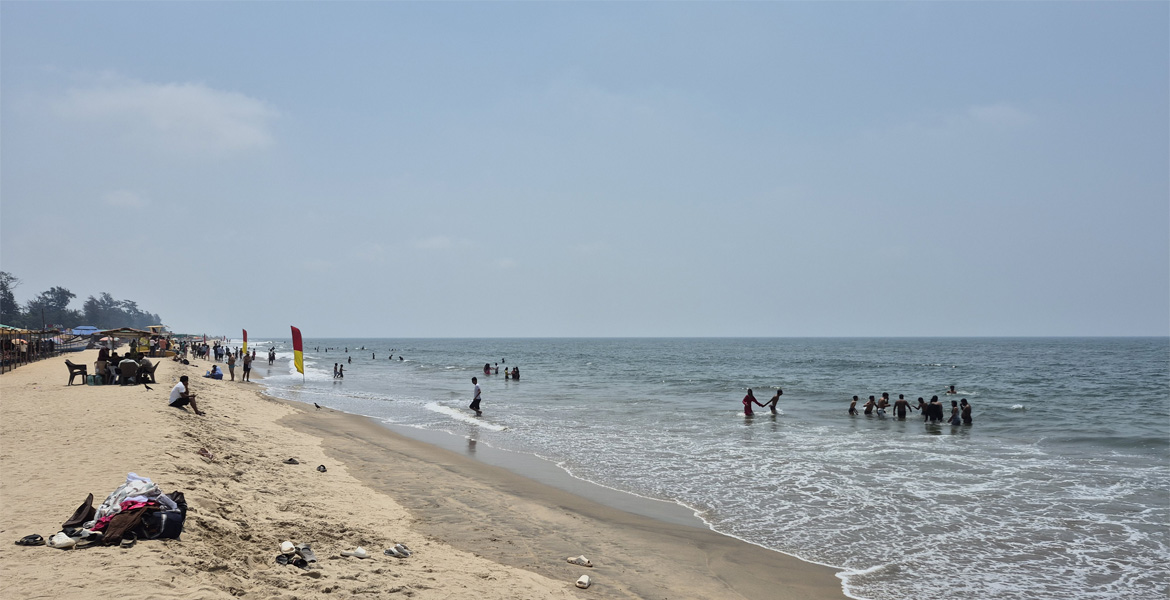 Visitors enjoying Arambol Beach Goa