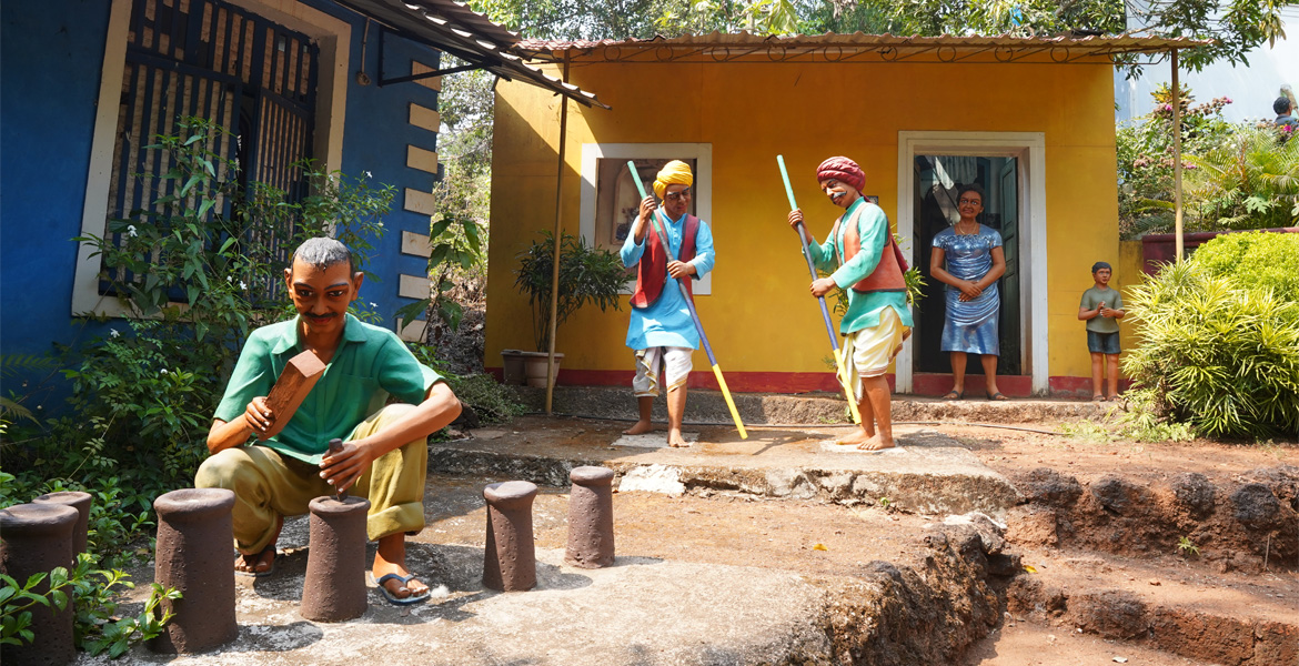 Traditional Goan village life sculptures at Big Foot Goa heritage museum in Loutolim