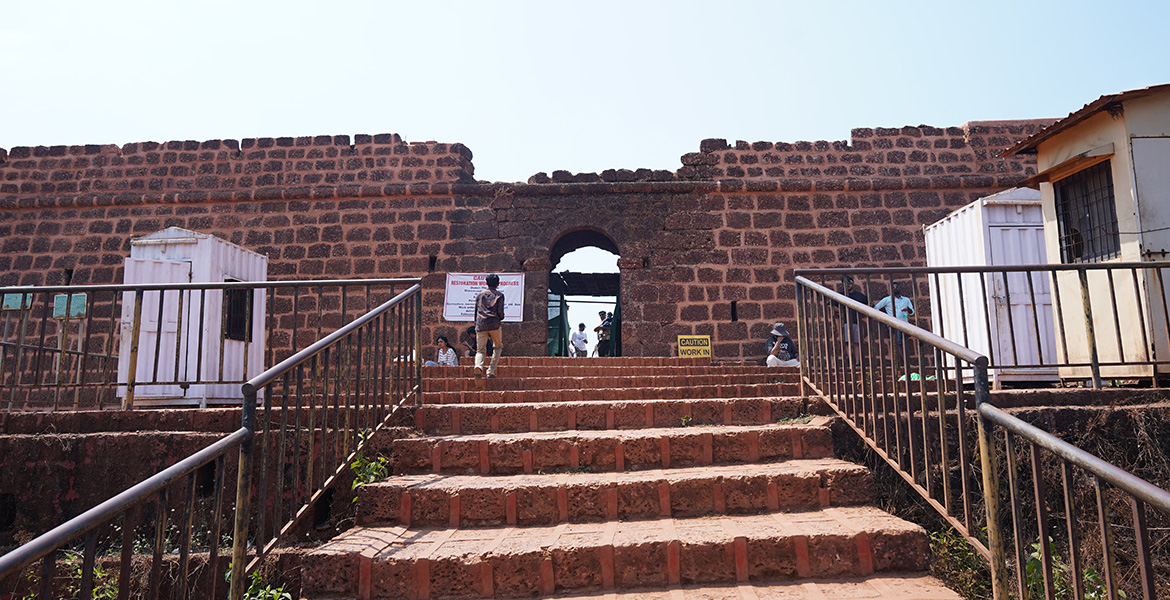 Stone staircase and entrance gateway at Chapora Fort in Goa
