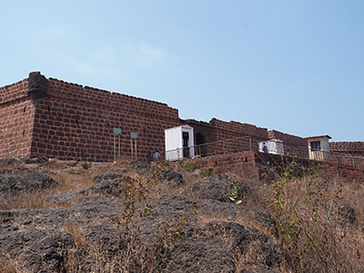 Historic stone fort walls and pathways at Chapora Fort in Goa