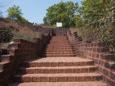 Historic stone stairway inside Chapora Fort in Goa