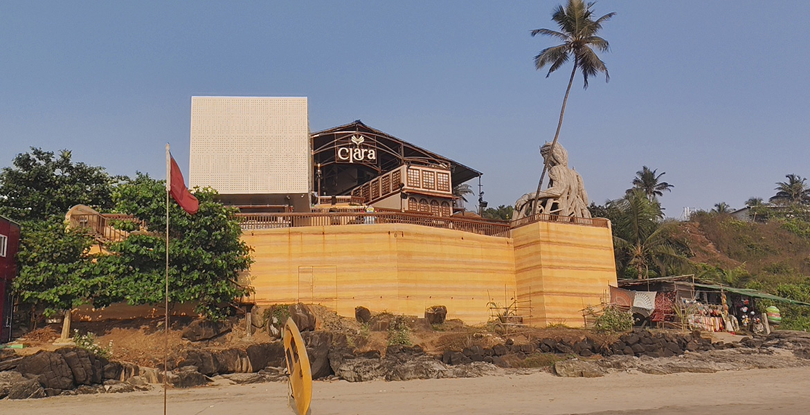 Clara beachside venue near Goa nightlife area with coastal view and palm trees