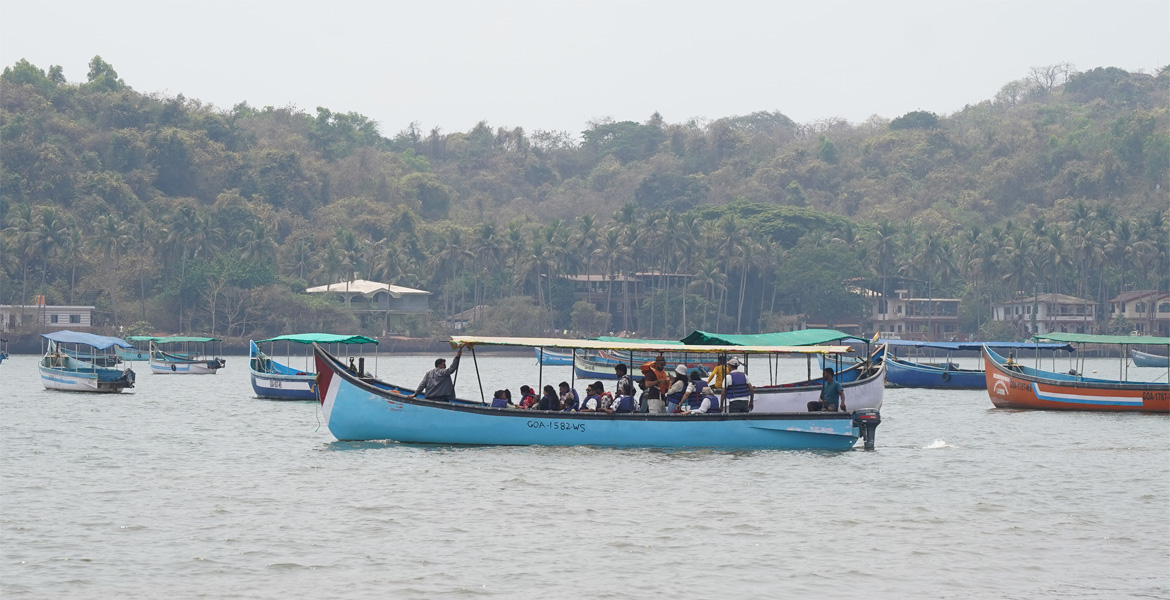 Dolphin tour boat at Coco Beach Goa