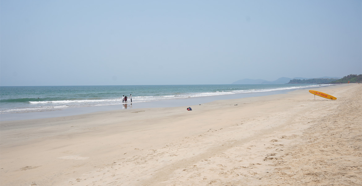 Wide sandy shore at Galgibaga Beach, Goa.