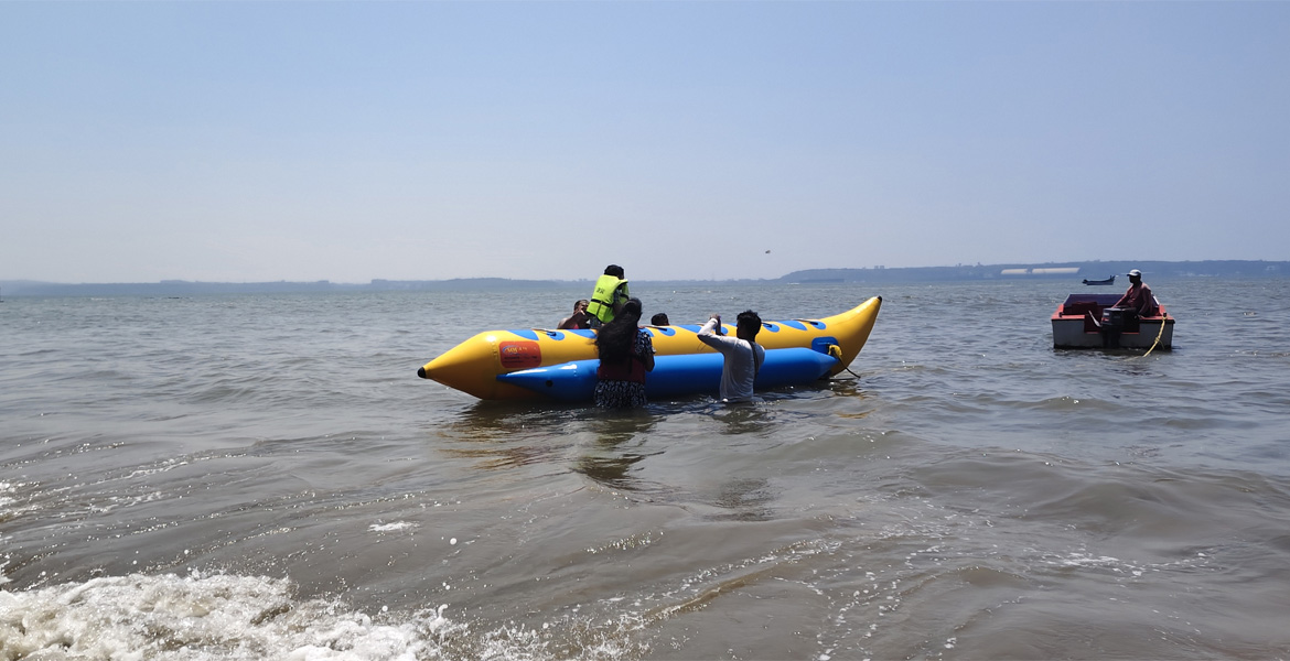 Tourists boarding a banana boat in Goa