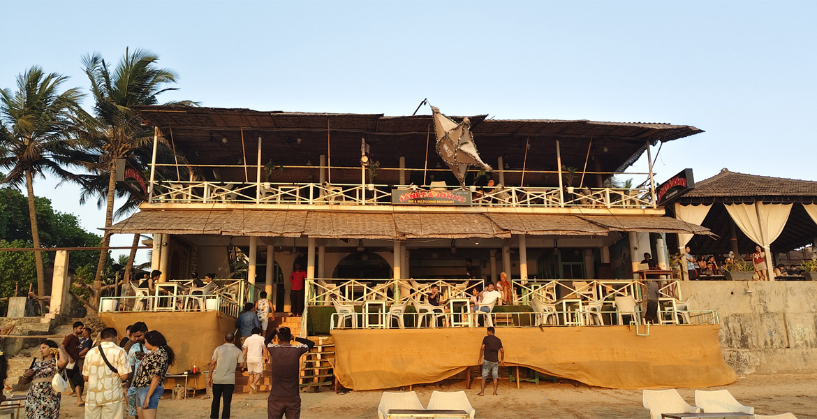 Goa beach restaurant with open-air seating and wooden architecture