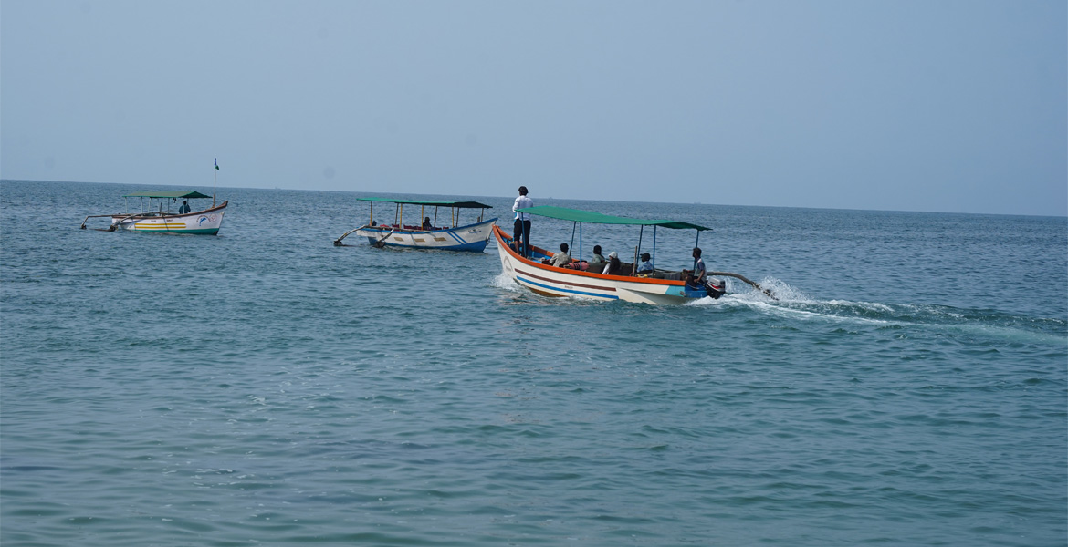 Tourists enjoying a boat ride in Goa
