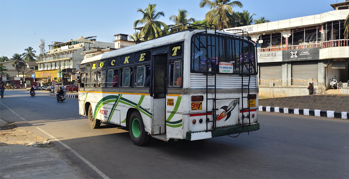Goa local bus driving on a city road