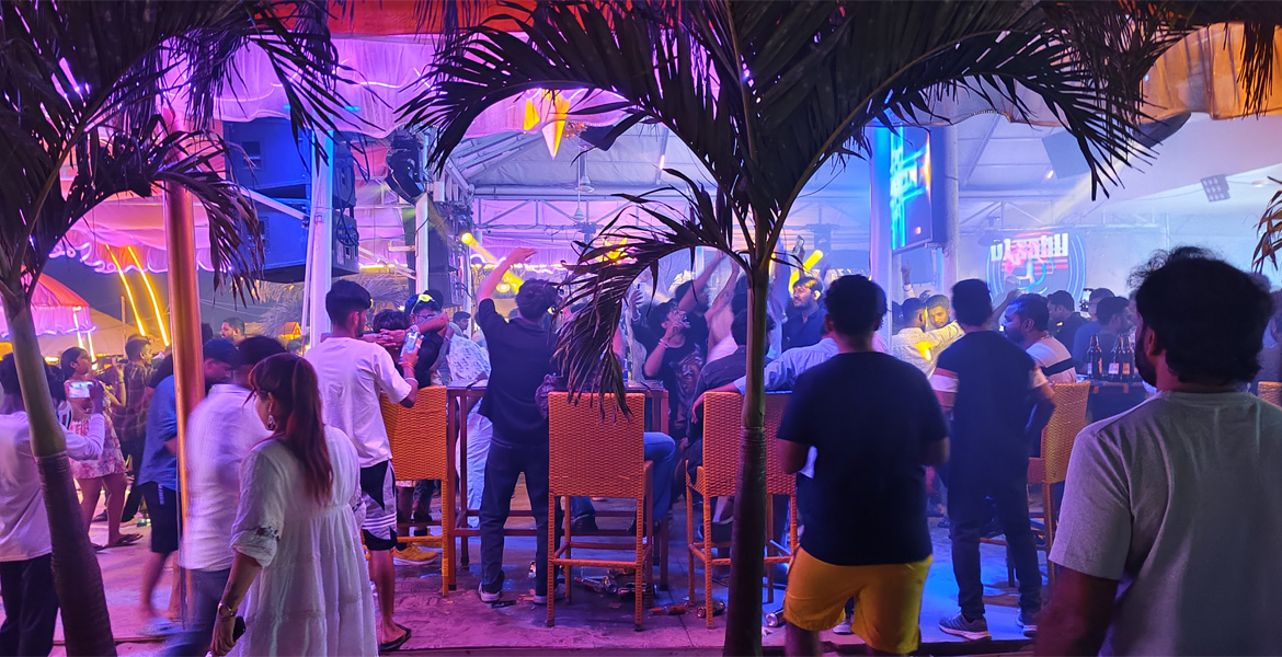 Crowd enjoying a lively nightlife party in Goa