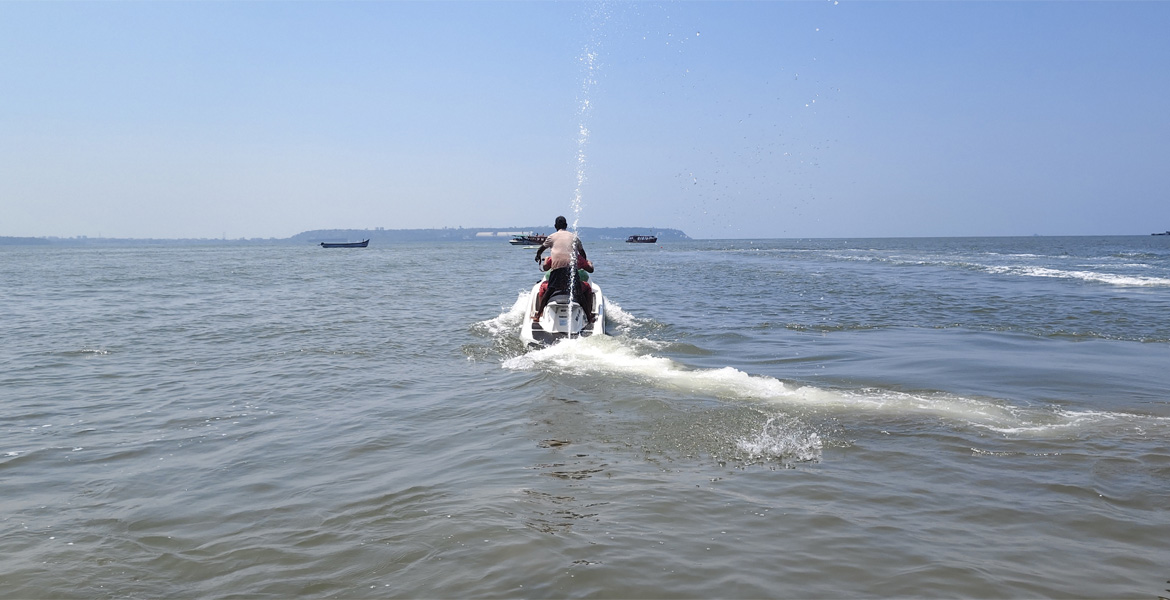 Rider speeding across Goa sea