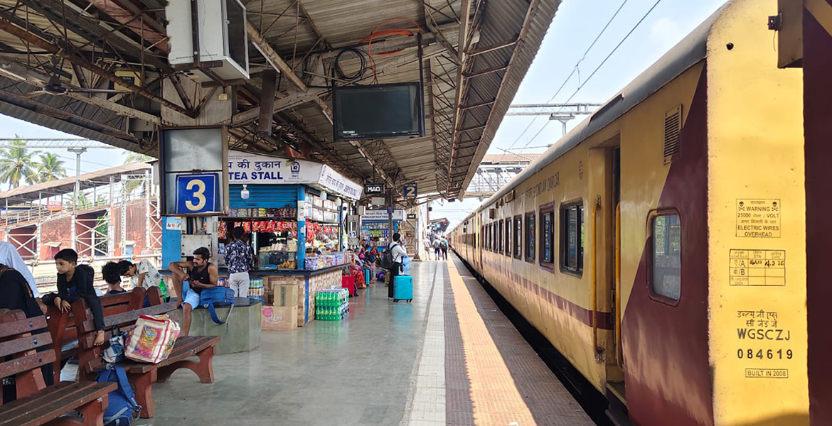 Madgaon Railway Station platform with train and tea stall