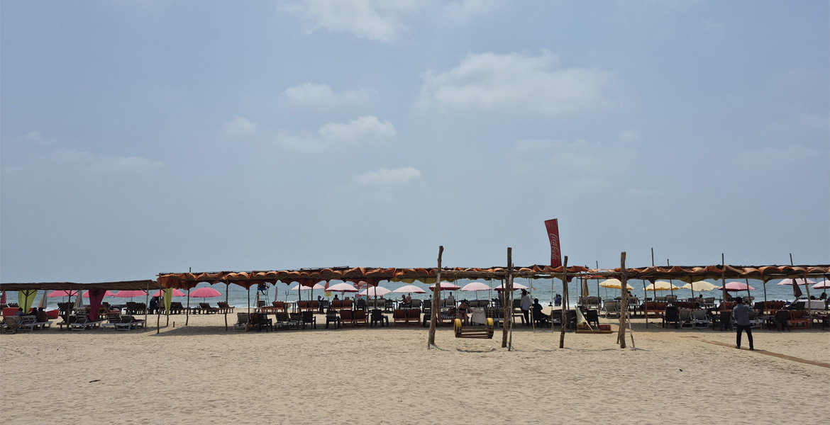 Beach shacks and outdoor seating at Mandrem Beach, Goa