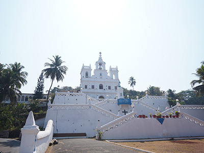 Our Lady of the Immaculate Conception Church in Goa with its iconic white façade and grand staircase