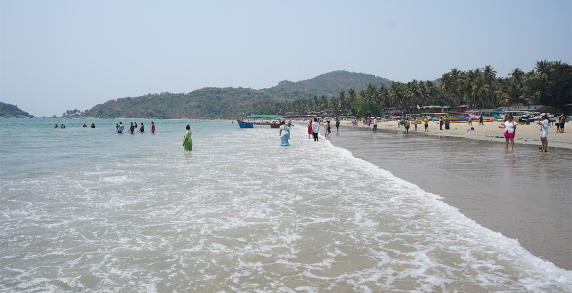 People enjoying the beach at Palolem Beach, Goa