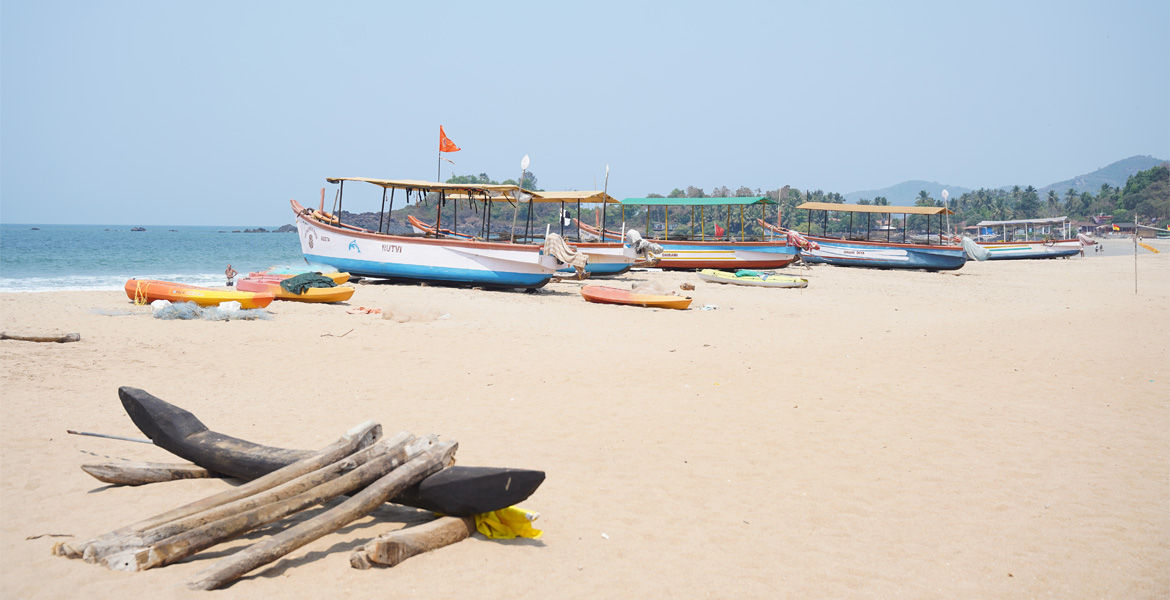 Fishing boats and kayaks at Patnem Beach, Goa