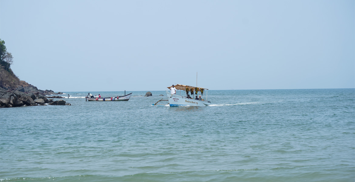 Boats on the sea at Rajbag Beach, Goa