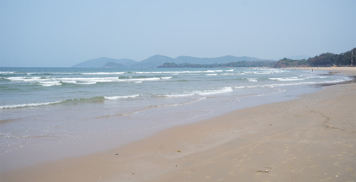 Sandy coastline at Rajbag Beach, Goa