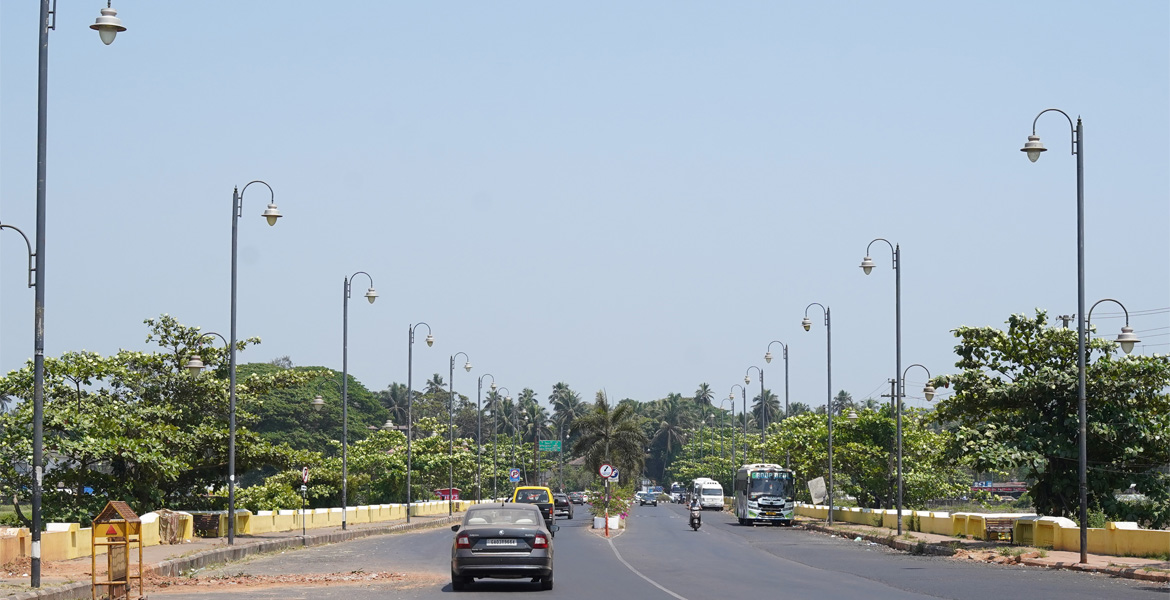 Road near Saligao Church in North Goa leading to nearby attractions and activities