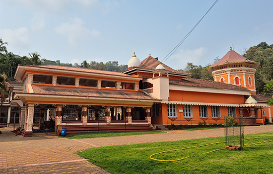 Shree Shantadurga Temple in Kavale, Goa featuring traditional Hindu temple architecture and landscaped surroundings