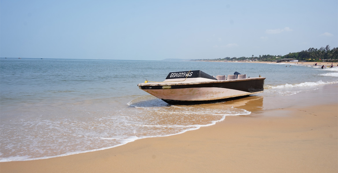 Speed boat parked on a Goa beach