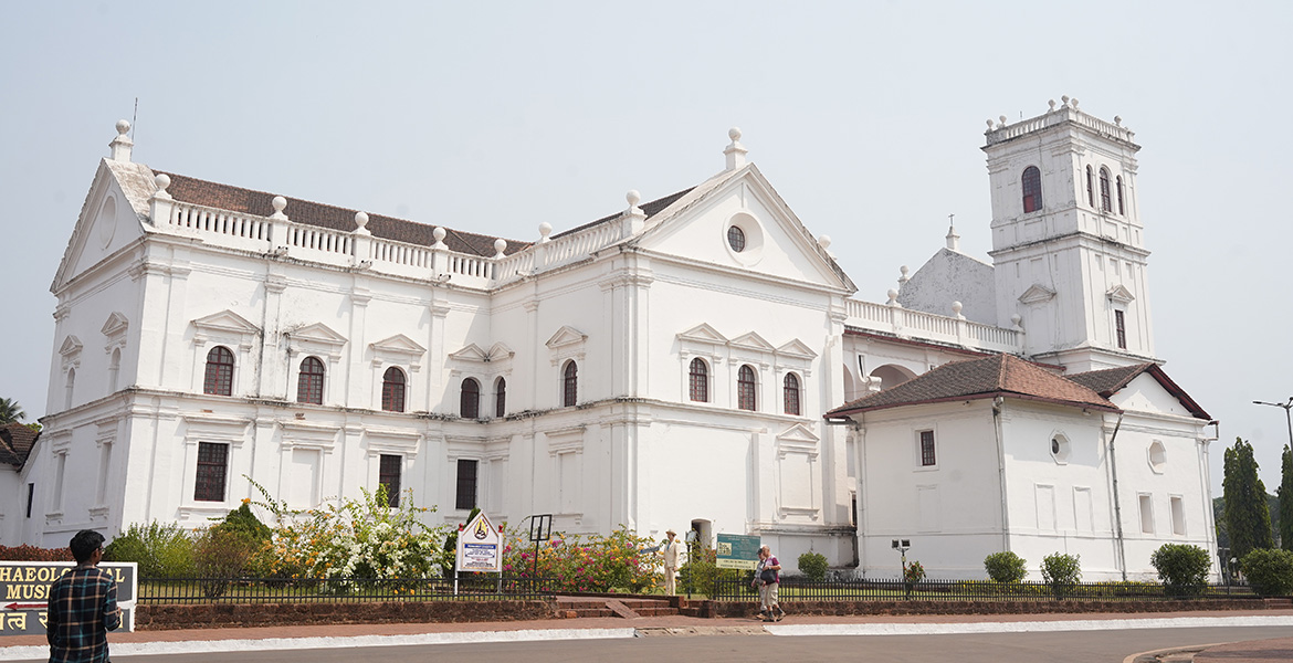 Historic St. Francis of Assisi Church with white Portuguese-style architecture in Old Goa