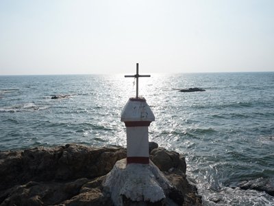 Coastal cross monument overlooking the Arabian Sea