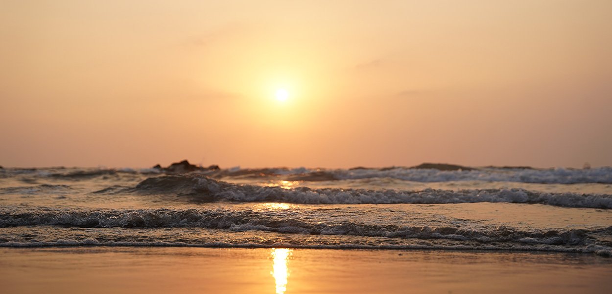 Vagator Beach sunset with ocean waves