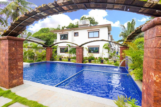 Exterior view with pool at DE12 Villa in Anjuna