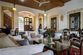 Traditional heritage villa living room with elegant seating and decor