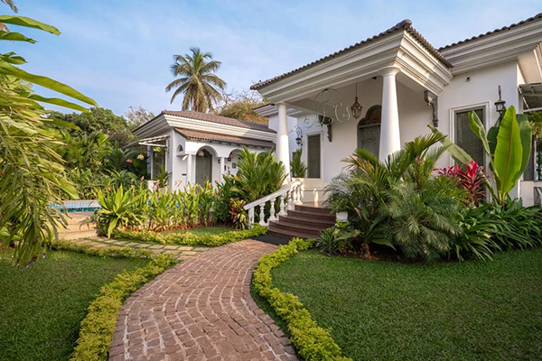Luxury villa with landscaped garden and front entrance