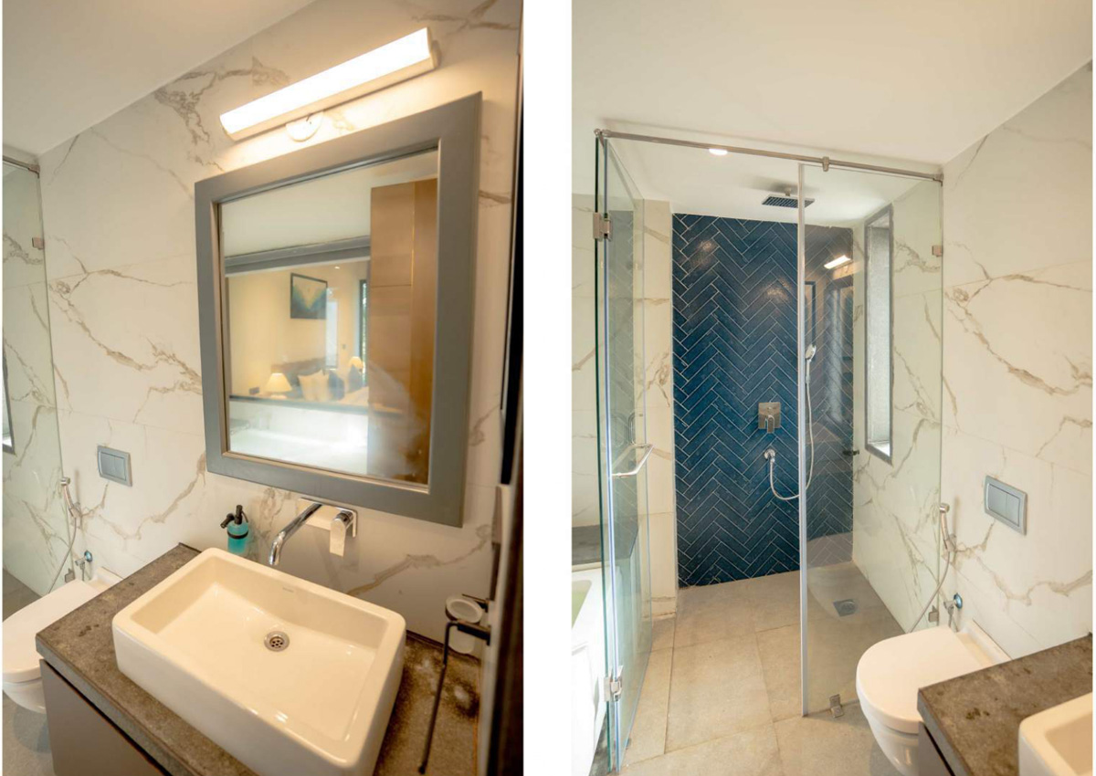  Detailed view of bed with beige pillows, white duvet, and decorative runner